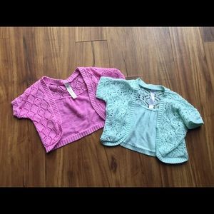 2 girls shrug sweaters